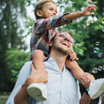 Father and son having fun in the park